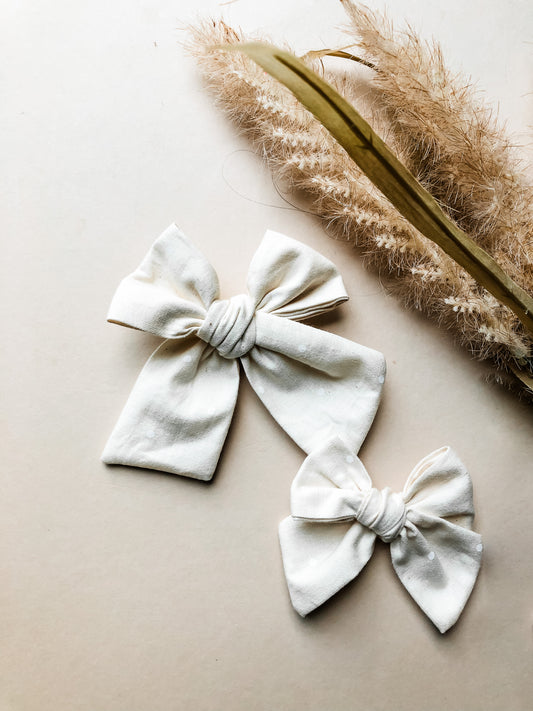 Cream polka dot knot
